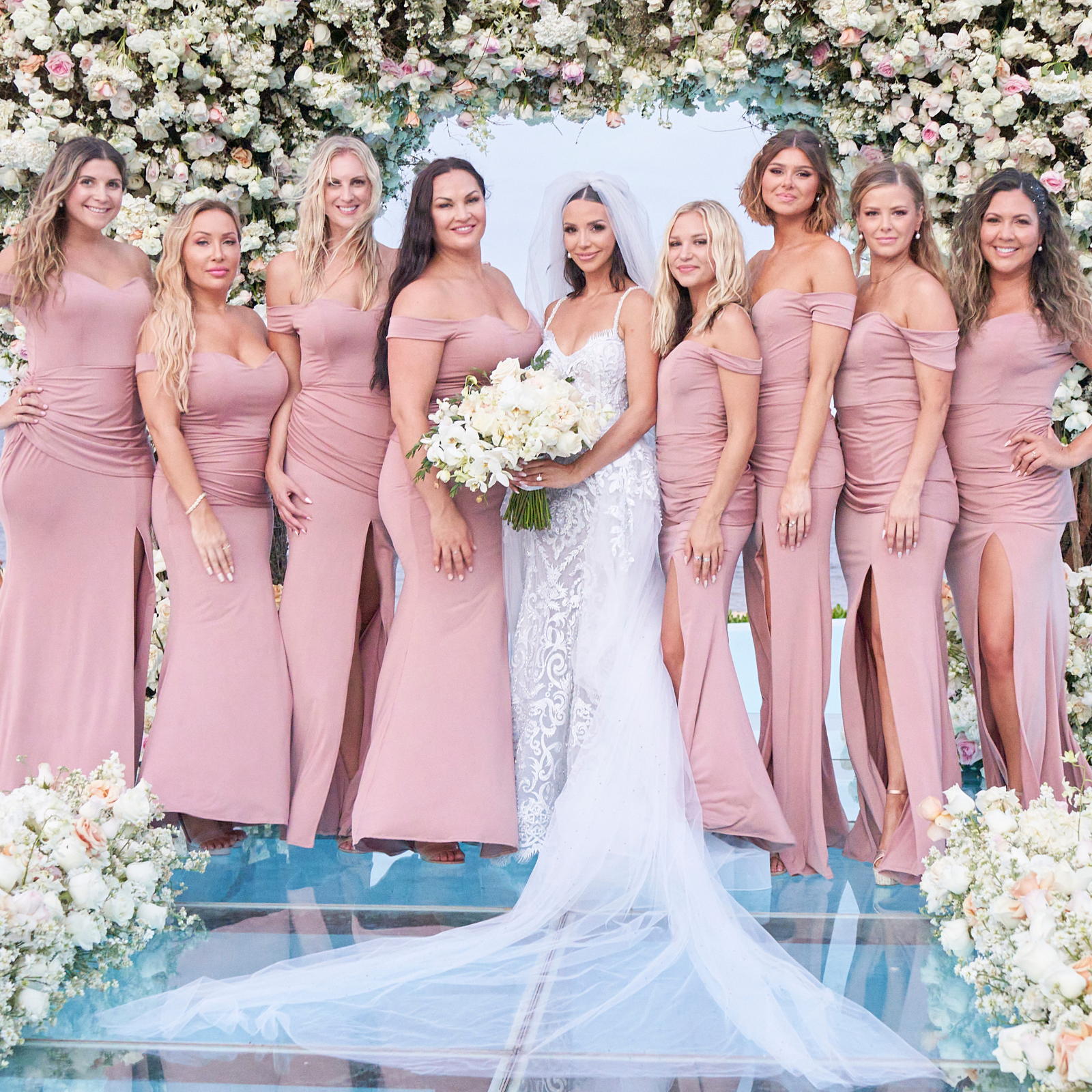 Bridesmaids wearing blush Pia Gladys Perey dresses at Scheana Shay’s wedding